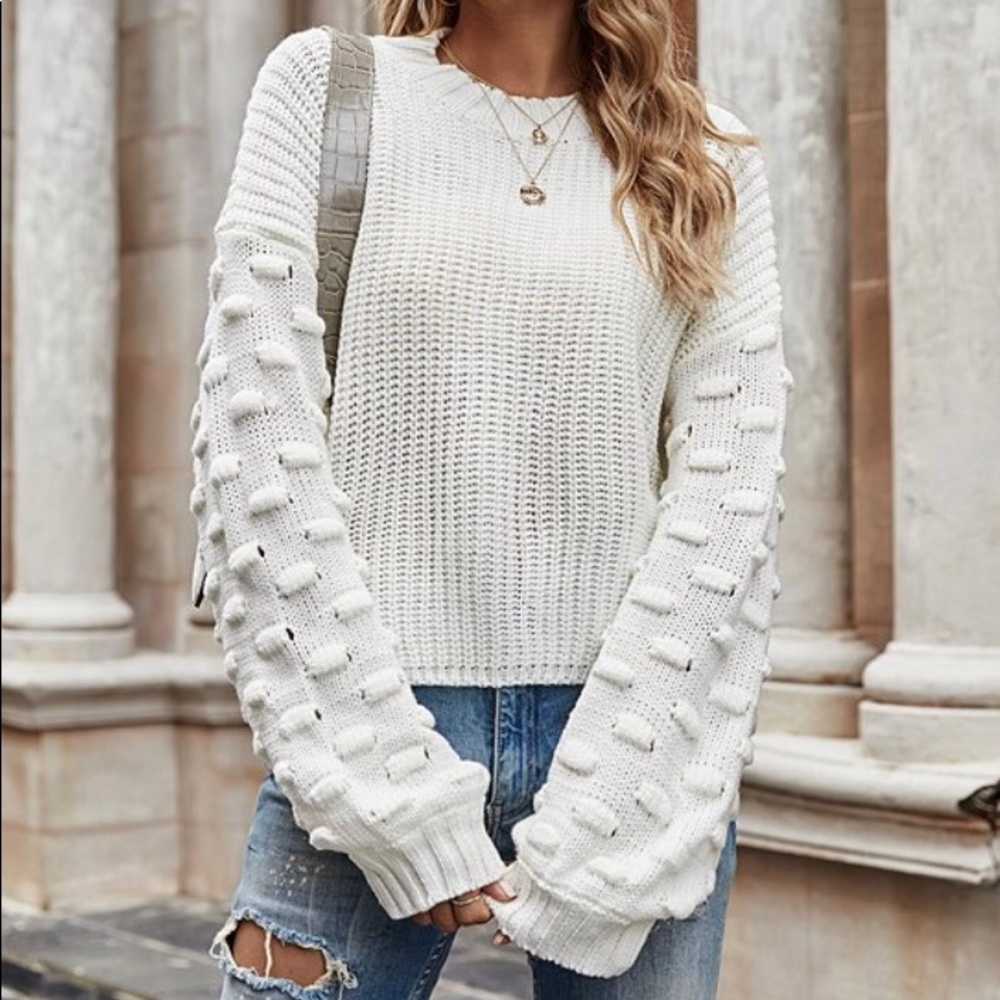 White block-texture Bishop-sleeve sweater.